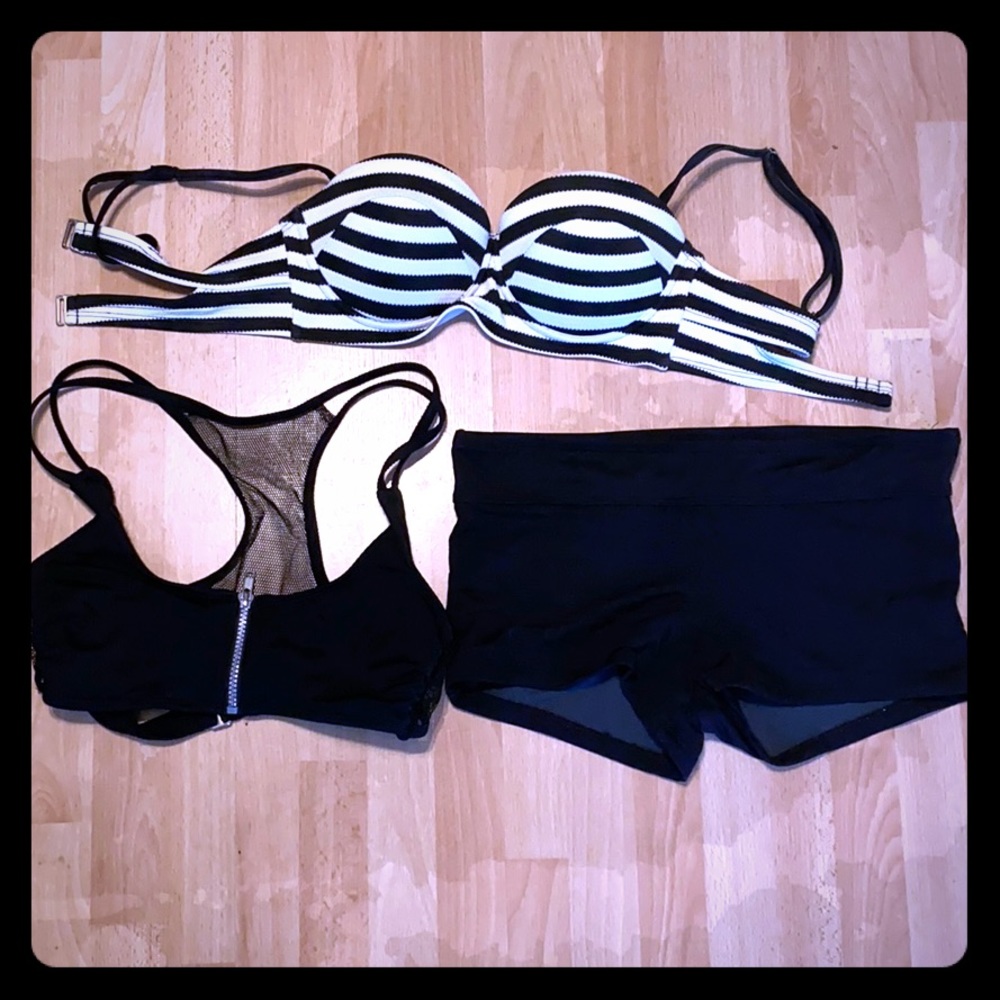 Two bathing suit tops and one bottom size medium